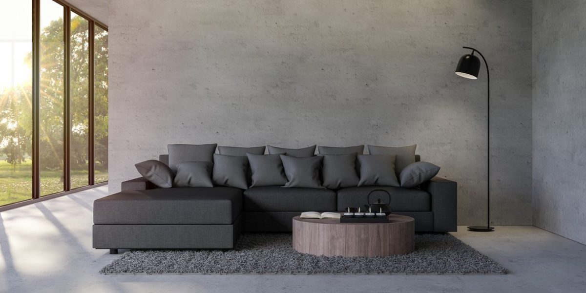 Modern loft style living room with empty concrete wall 3d render,there are polished concrete floor decorate with black fabric furniture overlooking nature view with sunlight.